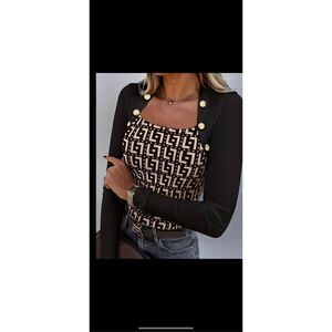 Beautiful Jacquard print top dress it up or down either way it will turn heads